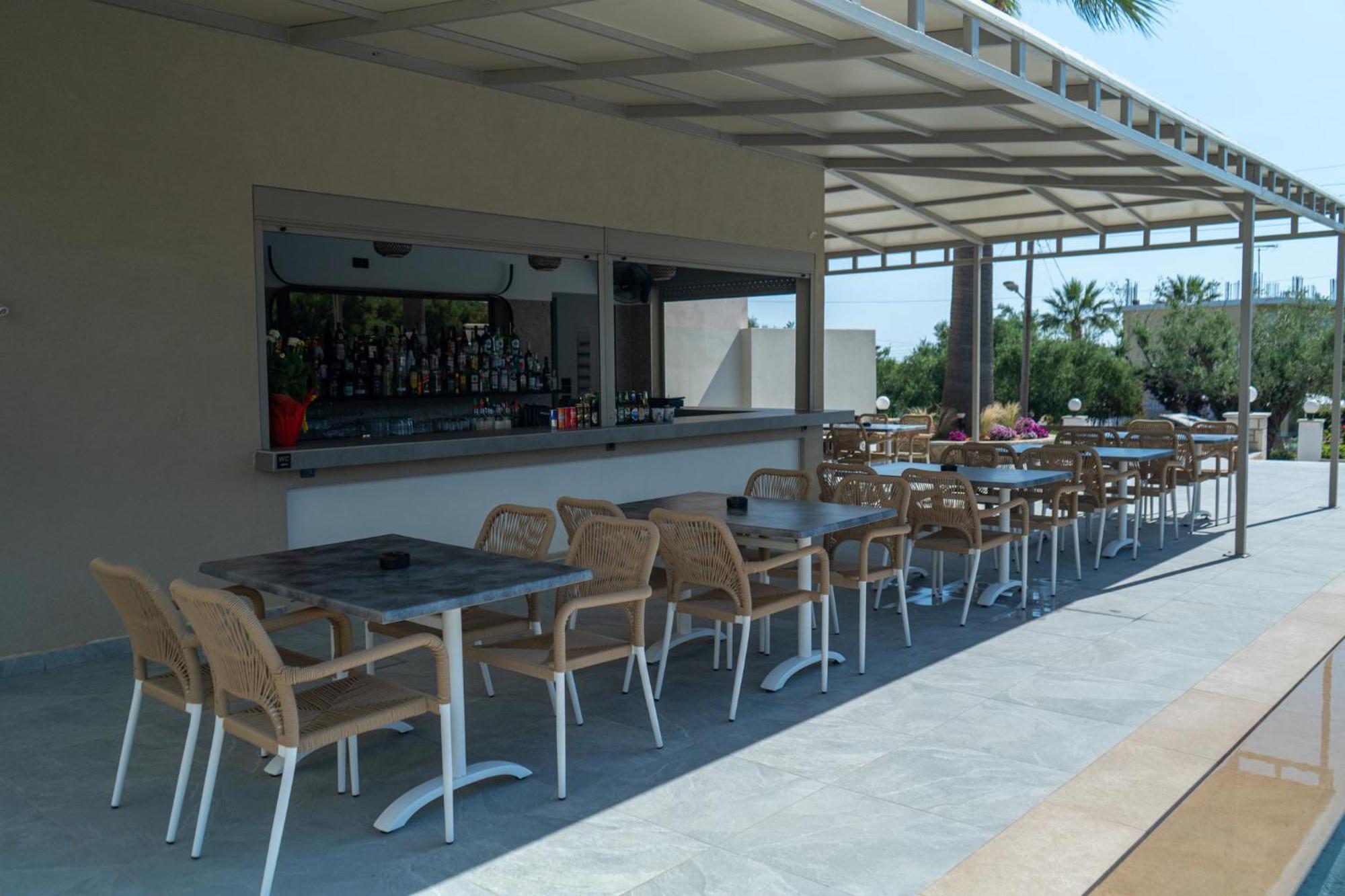 Remezzo Studios & Apartments Amoudi Luaran gambar