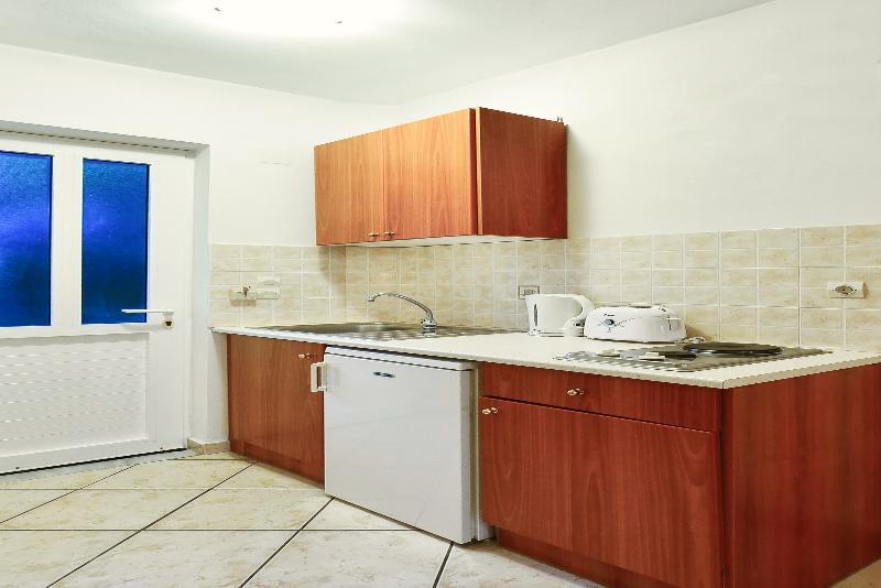 Remezzo Studios & Apartments Amoudi Luaran gambar